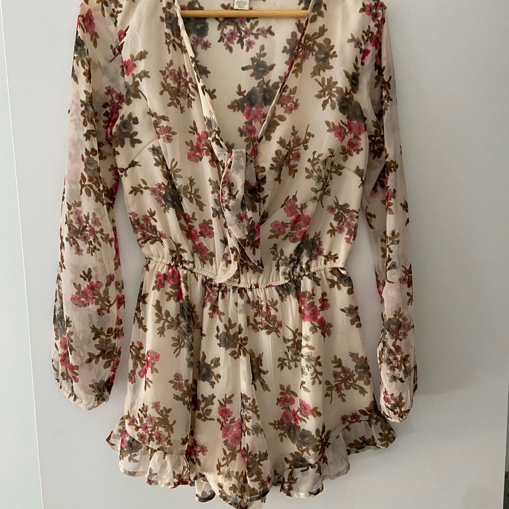 Floral long sleeved romper